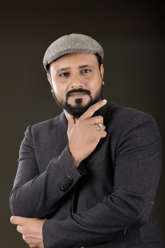 Imamuddin in a professional studio portrait